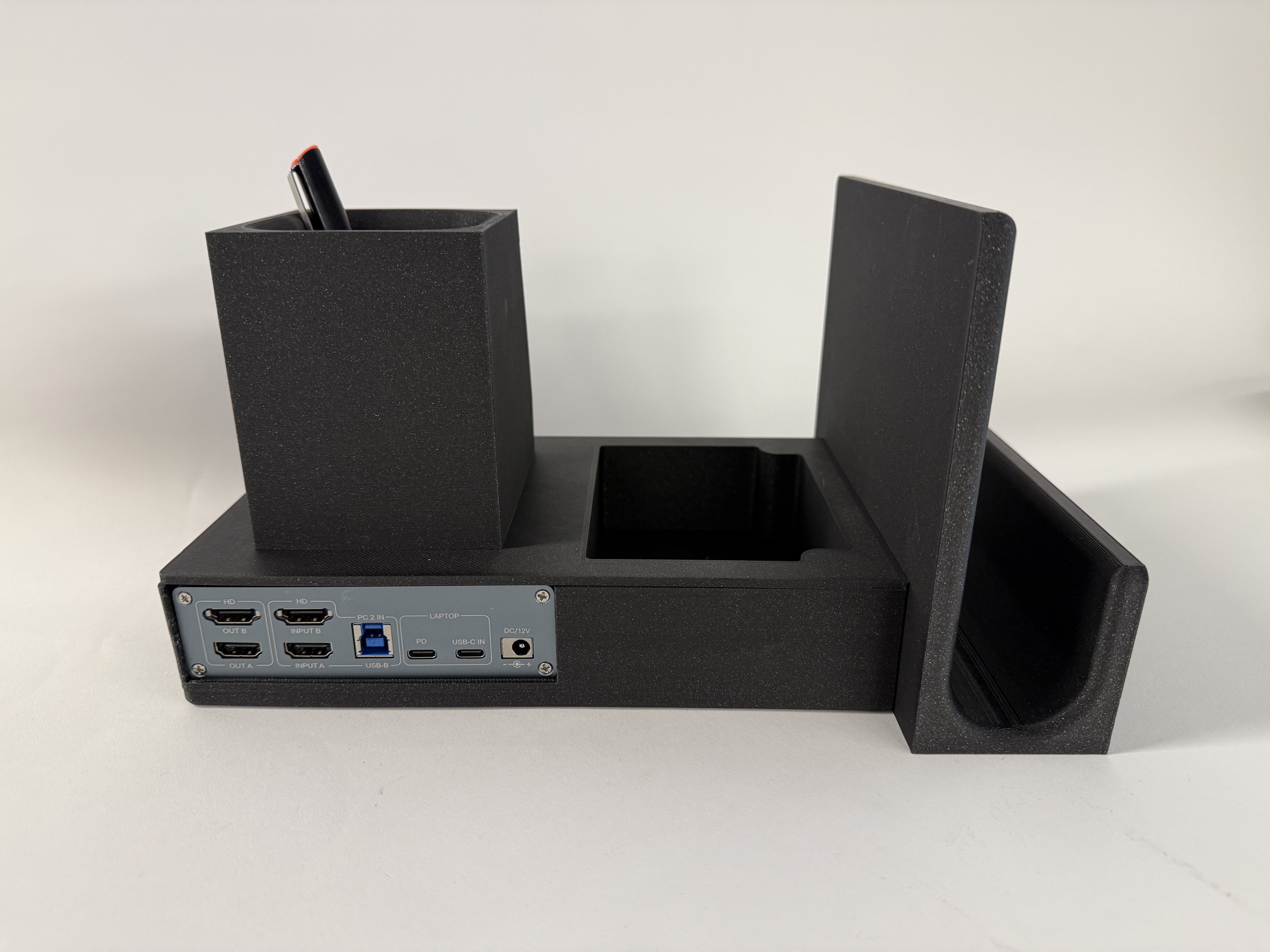 Rear view of the KVM box with HDMI, USB, and DC ports exposed